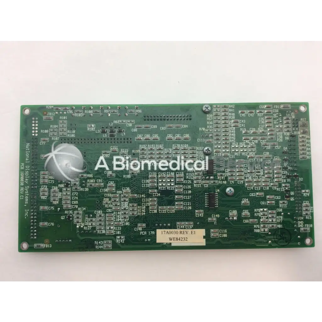 Green rectangular rev c1 pcb board with silver components and biomedical logo for national display 16a0030 rev product