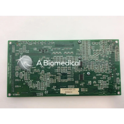 Green rectangular rev c1 pcb board with silver components and biomedical logo for national display 16a0030 rev product