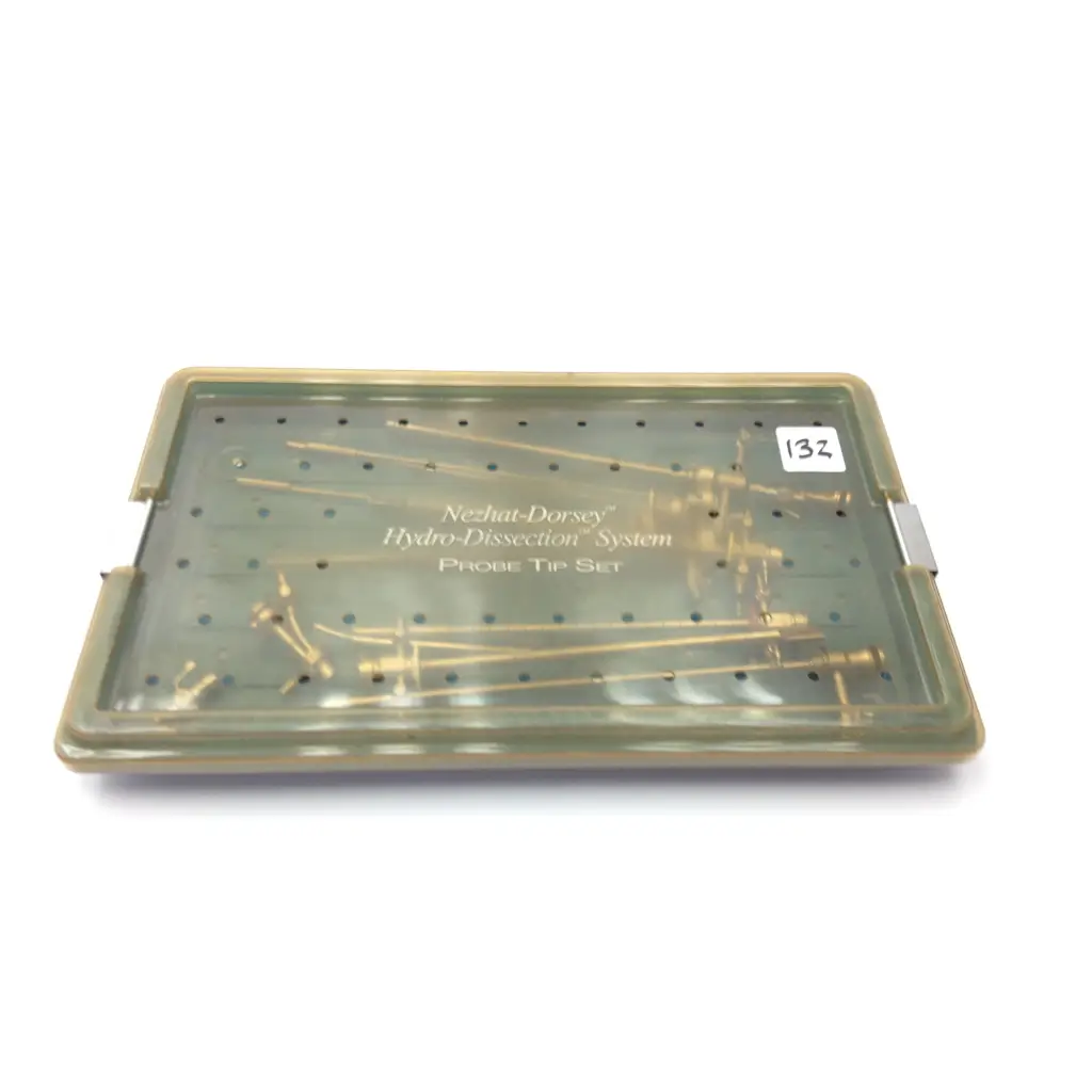 Translucent green plastic case containing gold-colored probe tip set for nezhat-dorsey hydro-dissection system