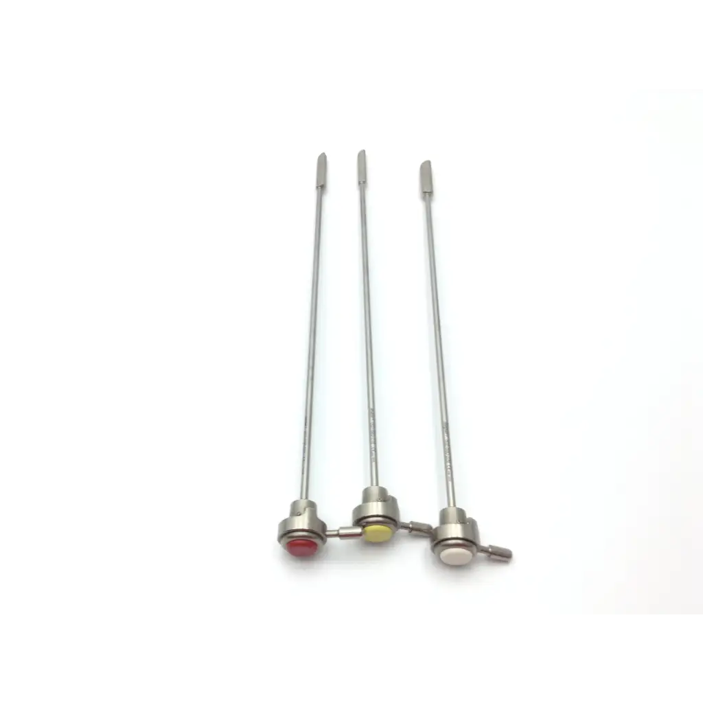 Three stainless steel surgical forceps with red yellow and white tips from nezhat-dorsey hydro-dissection probe tip set