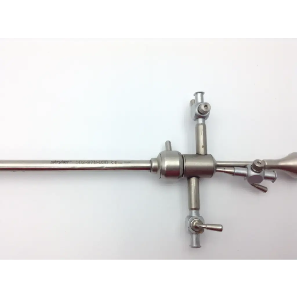 Nezhat-Dorsey stainless steel probe tip set with long slender shaft and cross-shaped handle with adjustment knobs