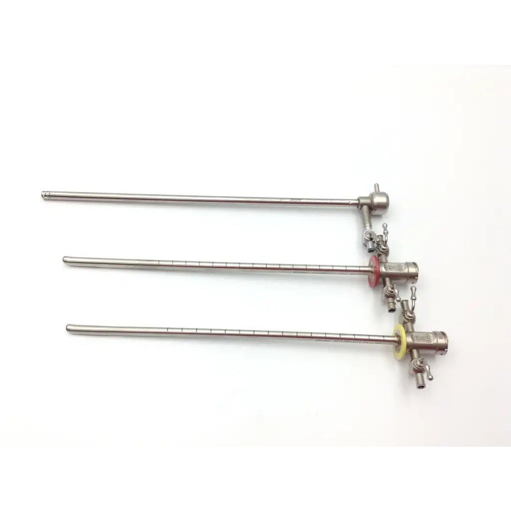 Three stainless steel surgical endoscopes with red and yellow rubber seals in the nezhat-dorsey hydro-dissection probe tip set
