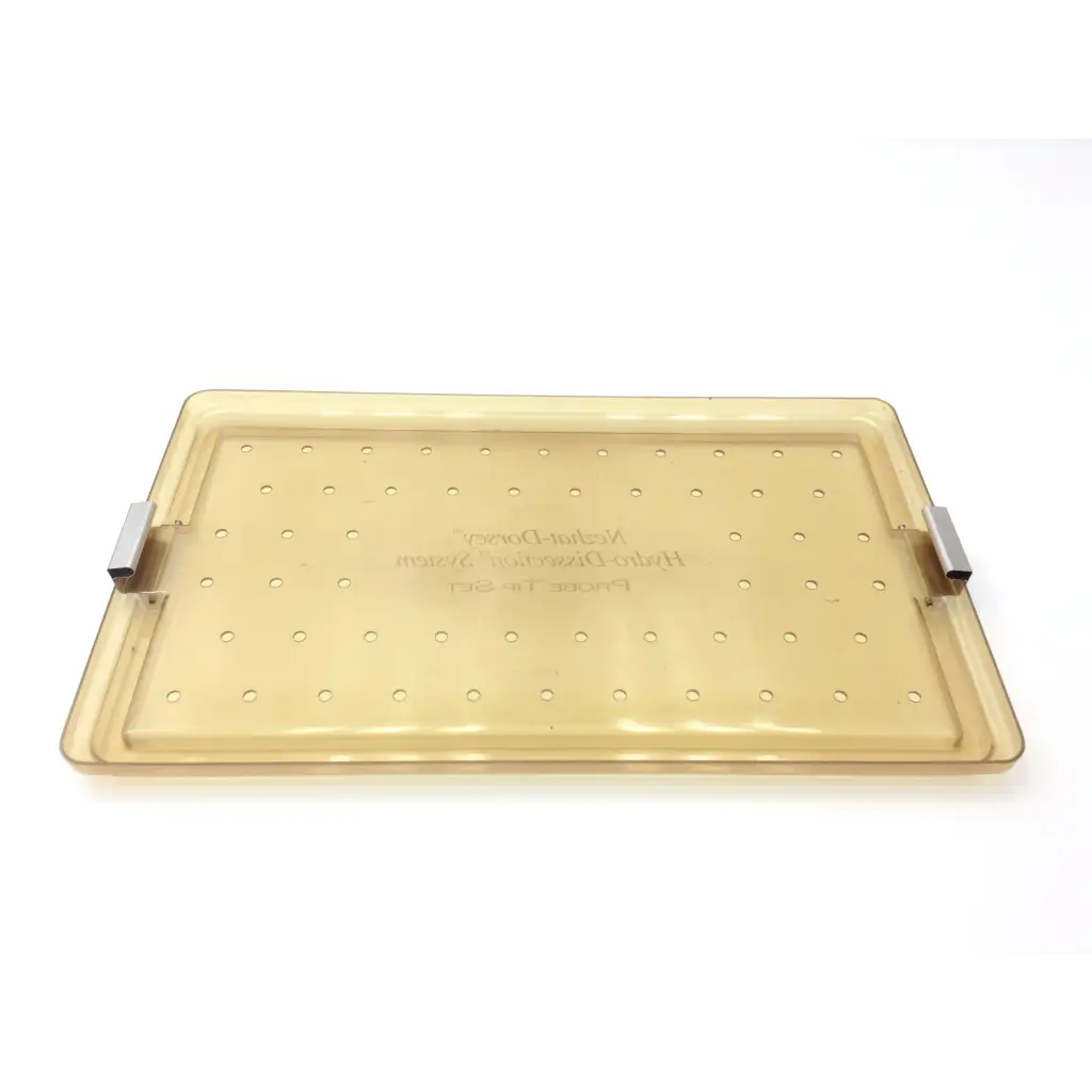 Clear amber-colored plastic tray with small perforations and metallic handles for nezhat-dorsey hydro-dissection probe tip set