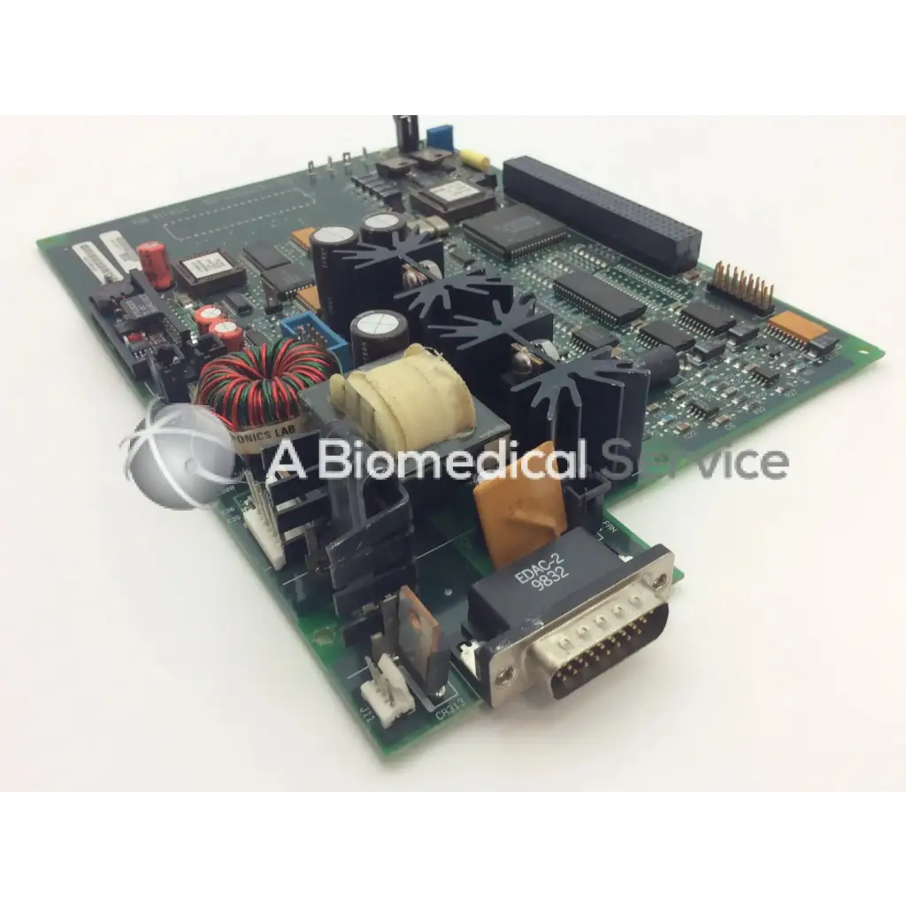 Green circuit board with black and beige components red wire coils and d-sub connector for north american drager asm gap personality pcb