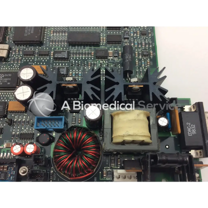 Green circuit board with black and silver components red and green wire coils and beige transformer for north american drager asm gap personality pcb