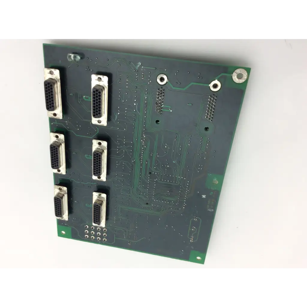 Green printed circuit board with six silver d-sub connectors from north american drager asm 4114376 h board