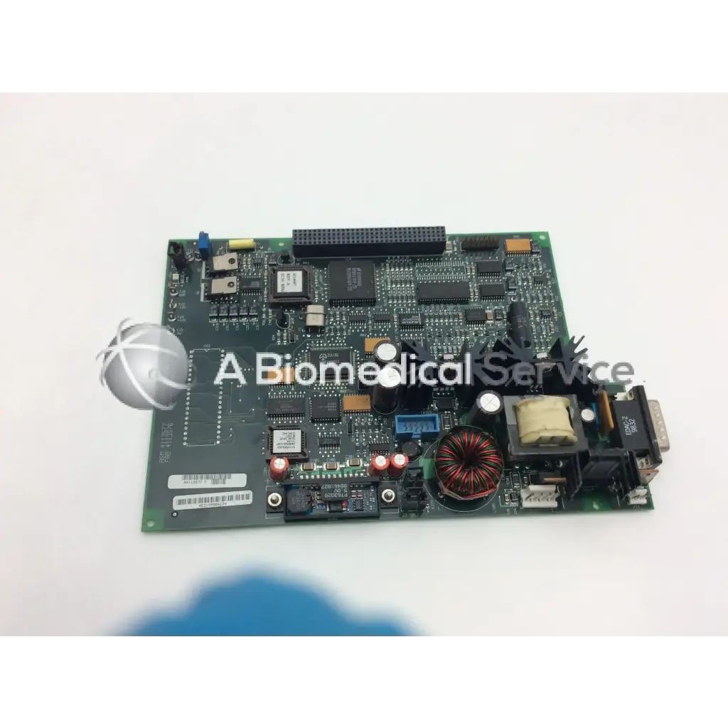 Green circuit board with black and silver components and red coil inductor for north american drager gap personality pcb