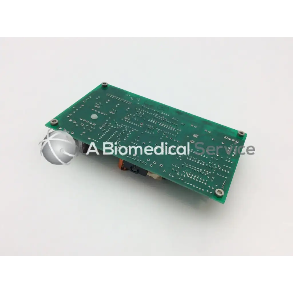Green rectangular circuit board with silver screws and soldered components of ohmeda a124-007 rev product