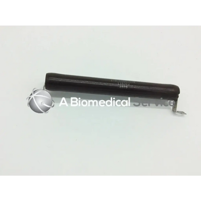 Black cylindrical vitreous enamel resistor ohmite 270-100m-538 with metallic attachment ends for electrical use