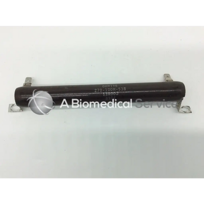 Dark brown cylindrical vitreous enamel resistor ohmite 270-100m-538 with metallic end terminals and printed specs