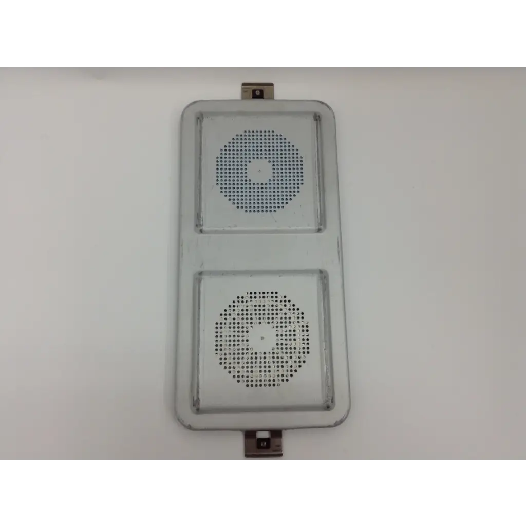 Gray metal traffic light housing with two circular perforated sections on the back of an olympus cystoscopy resection set with aesculap sterilization case