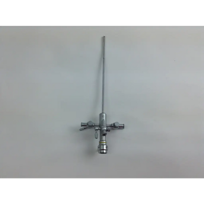 Silver surgical instrument with long slender shaft and control knobs in olympus cystoscopy resection set with aesculap sterilization case