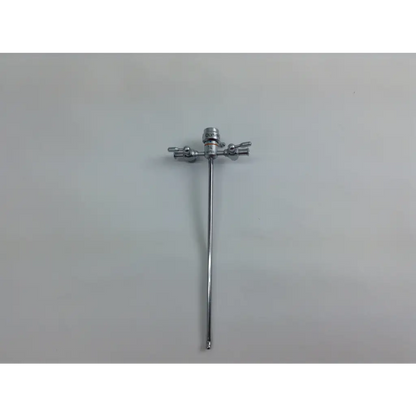 Silver surgical instrument with long slender shaft and dual side handles in olympus cystoscopy resection set with aesculap sterilization case