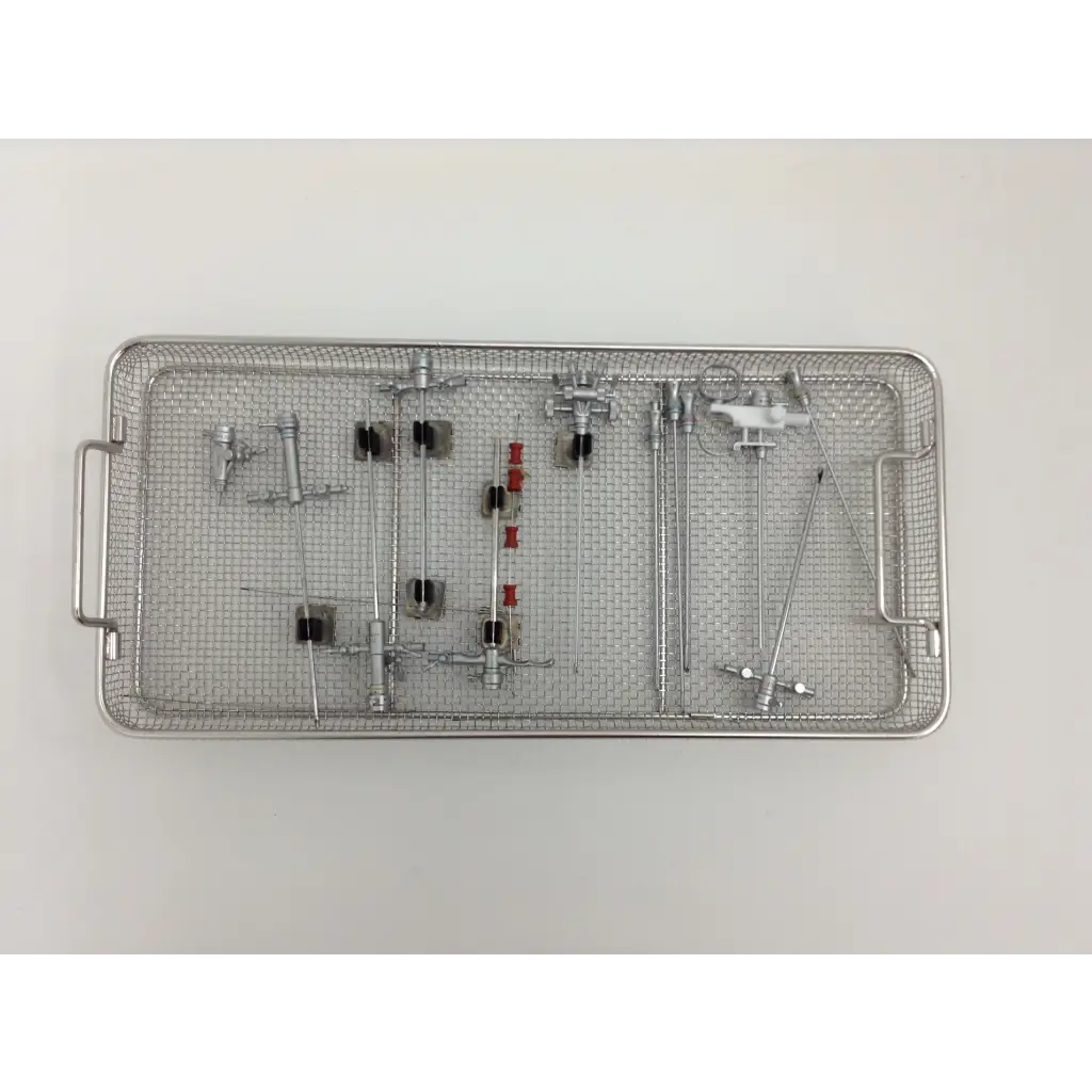 Sterilized olympus cystoscopy resection set with stainless steel tools in aesculap sterilization case with mesh tray