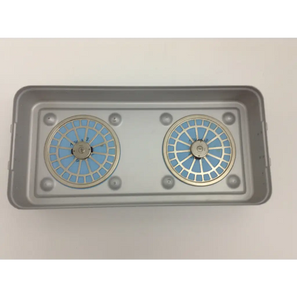 Gray rectangular tray holding two circular blue and silver filter units in olympus cystoscopy resection set with aesculap sterilization case