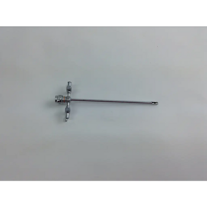 Silver surgical instrument with long slender shaft and three handles from olympus cystoscopy resection set with aesculap sterilization case