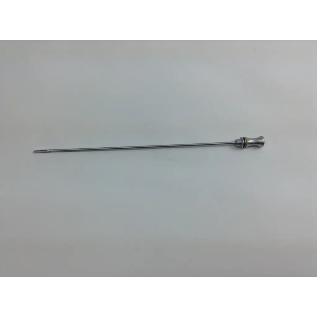 Silver surgical retractor with slender metallic shaft and textured handle from olympus cystoscopy resection set with aesculap sterilization case