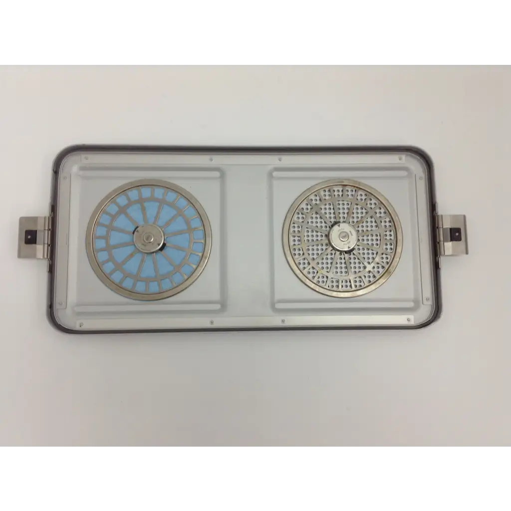 Rectangular electric griddle with two circular cooking surfaces in aesculap sterilization case for olympus cystoscopy resection set
