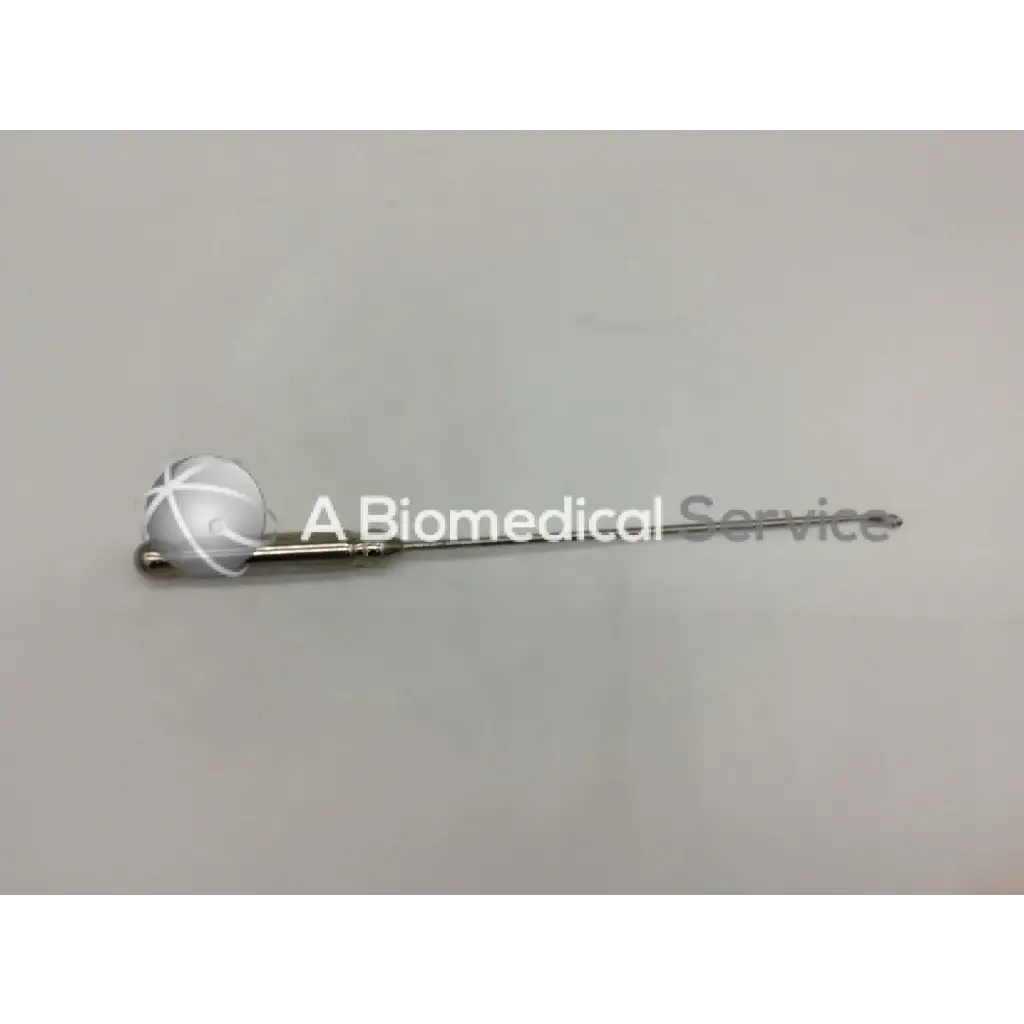 Silver-colored orthopedic systems inc 5451 hand instrument with spherical head and white crosshatch markings