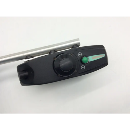 Black plastic pilot joystick d49637 with green button and dial mounted on metal rod for pride mobility jet wheelchair