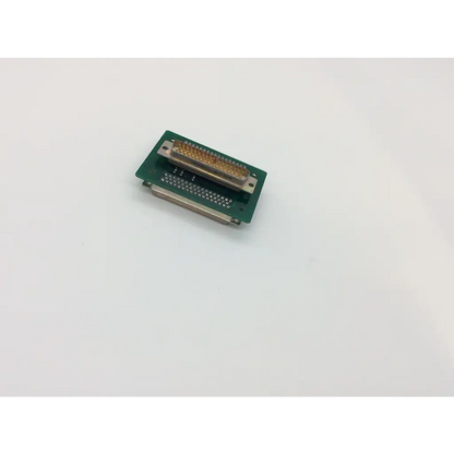 Green pcba adapter dge board by pbt technologies with metallic connector featuring gold-plated pins and silver housing