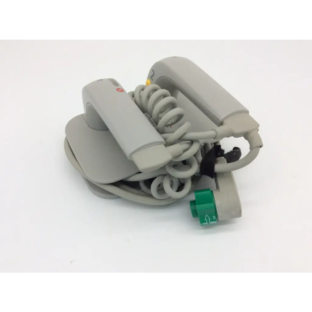 Philips external hard gray medical defibrillator with coiled cable and green connector for emergency use
