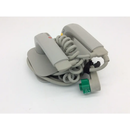 Philips external hard gray medical defibrillator with coiled cable and green connector for emergency use