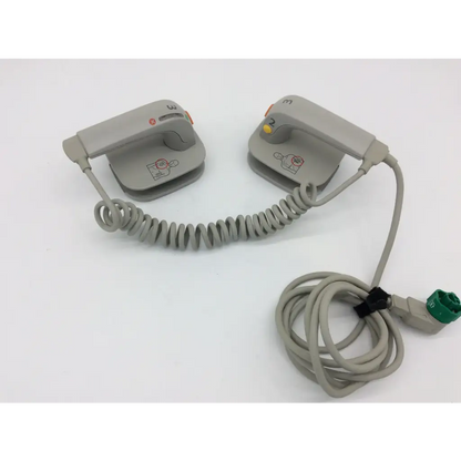Philips external hard gray plastic defibrillator pads with coiled cables and green connector for emergency use