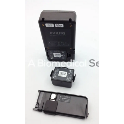 Black philips heartstart fr3 aed defibrillator with rectangular body and attached battery pack for emergency use