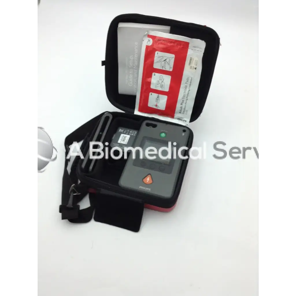 Philips heartstart fr3 aed defibrillator bundle with gray device black carrying case and red instruction packet inside