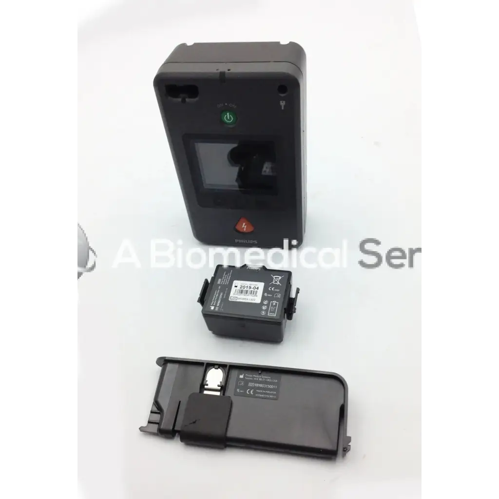 Black philips heartstart fr3 aed defibrillator with green power button and red emergency symbol for quick response
