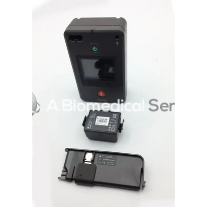 Black philips heartstart fr3 aed defibrillator with green power button and red emergency symbol for quick response