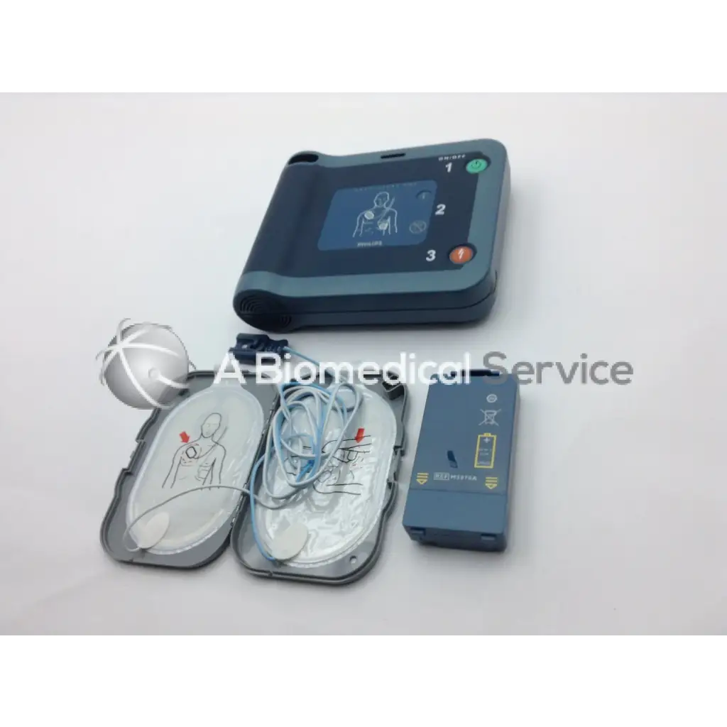 Dark gray philips heartstart frx aed trainer with smart pads battery and electrode pads for emergency use