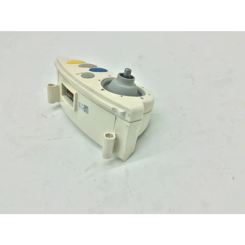 Cream-colored plastic philips m4046-61402 patient monitor controller with colorful buttons and central gray dial assembly