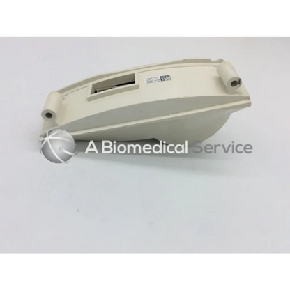 Beige plastic housing with integrated mounting holes and rectangular slot for philips intellivue m4046-61402 patient monitor controller dial assembly