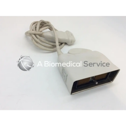Beige Philips L17-5 linear array ultrasound transducer probe with coiled cable and metallic connector array for medical use
