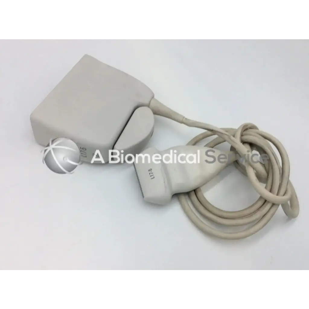 Beige philips l17-5 linear array ultrasound transducer probe with coiled cable and labeled array ultrasound transducer connector