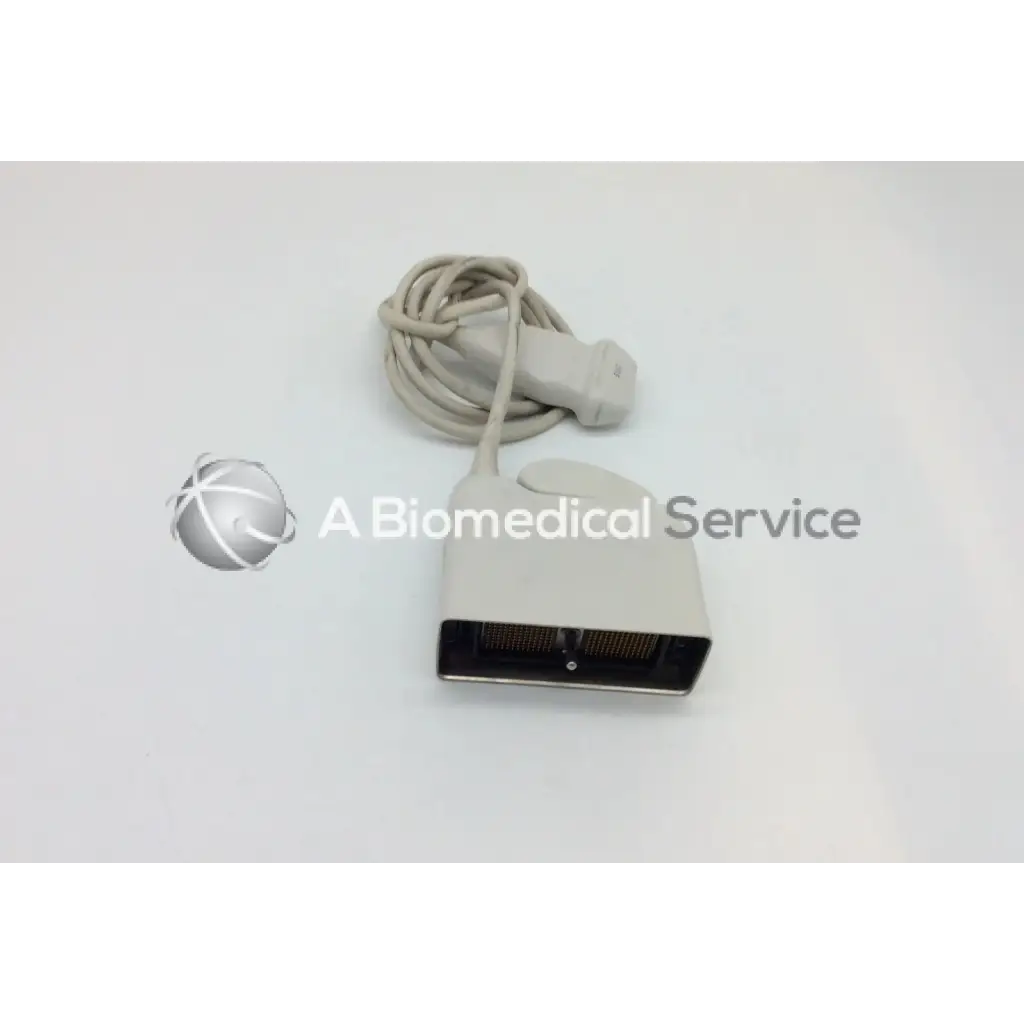 Beige philips l17-5 linear array ultrasound transducer probe with coiled cable and black connector for medical use
