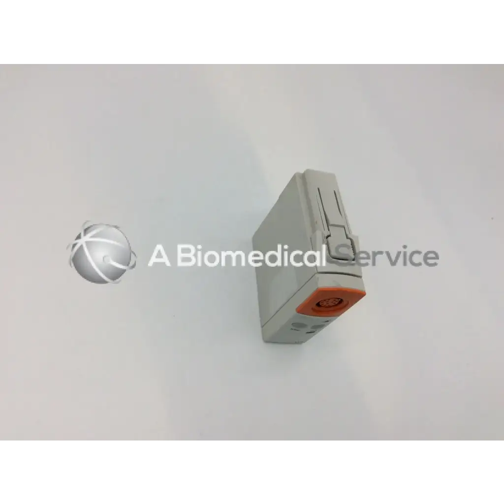 Gray rectangular philips m1012a continuous cardiac output monitoring module picco with orange latch and circular port on front