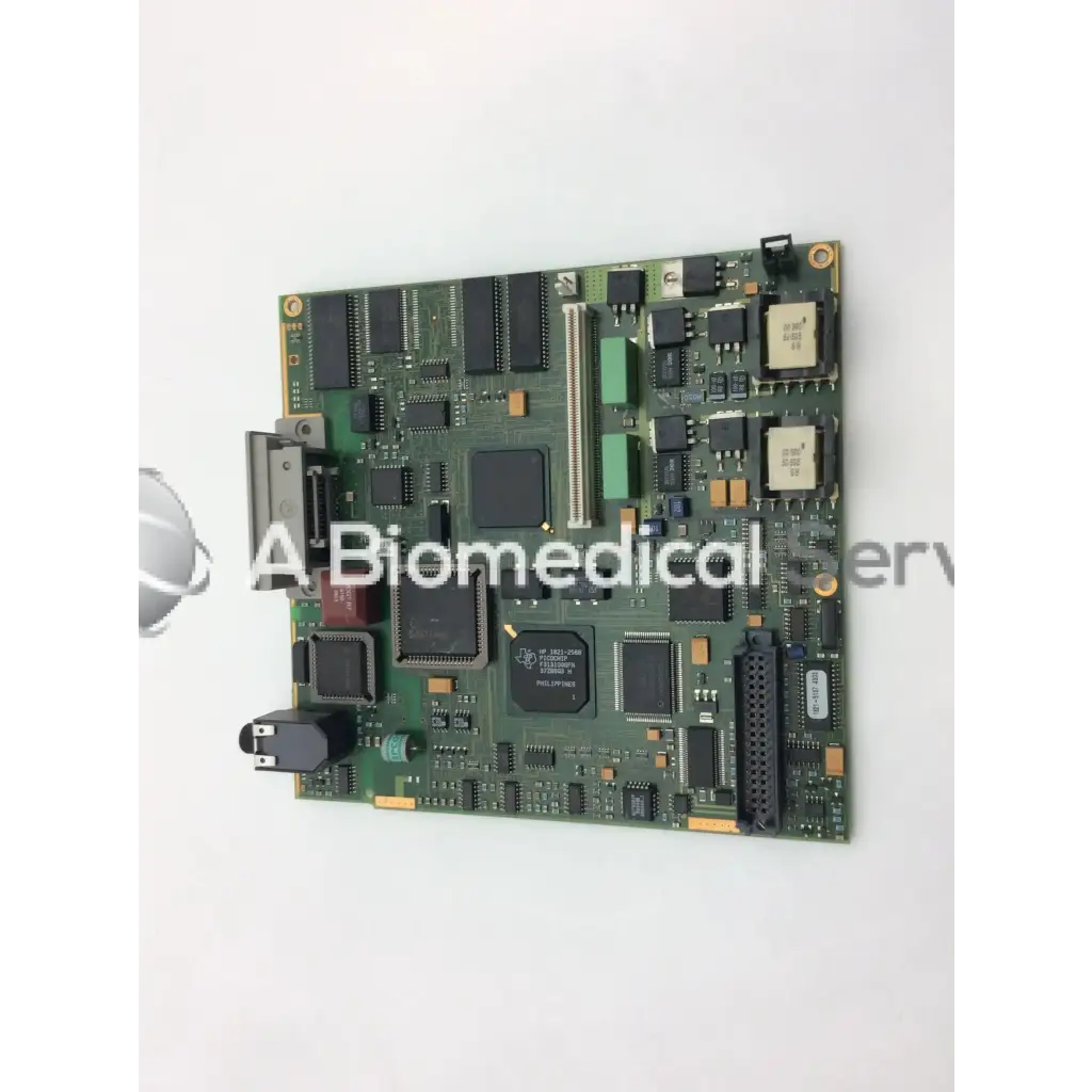 Philips M3046-66402 green patient monitor circuit board with black and silver electronic components for monitoring devices