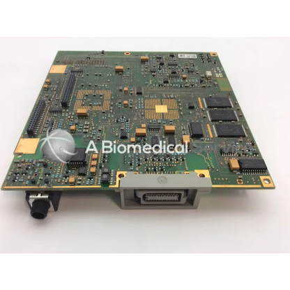 Philips M3046-66402 patient monitor circuit board with green PCB, gold contacts, black and orange ICs, and gray connector housing