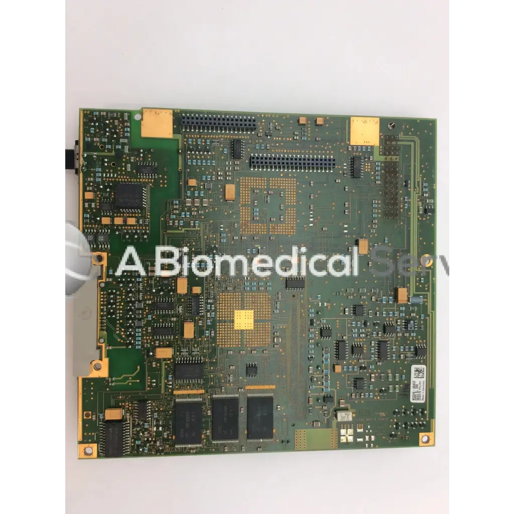 Green patient monitor circuit board by Philips featuring black and gold electronic components for medical use