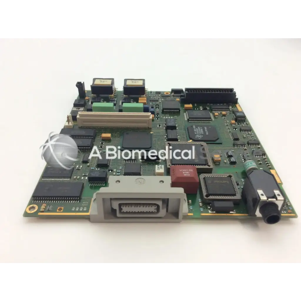 Philips m3046-66402 patient monitor circuit board with green board, black and gray components, and red rectangular chip