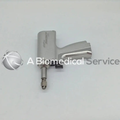 Silver stryker system 5 double trigger rotary surgical drill with textured grip and precision bit for medical use