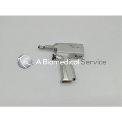 Silver surgical double trigger rotary drill with textured grip black trigger and engraved stryker branding