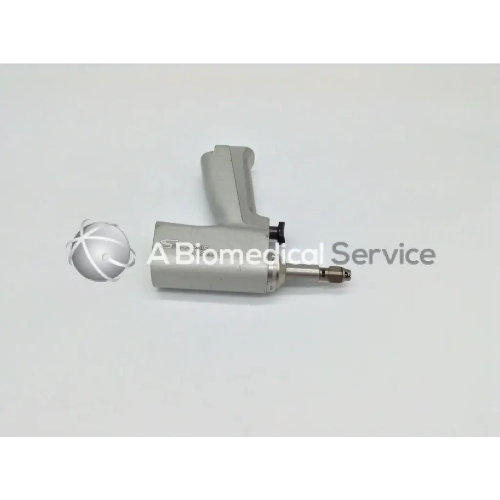 Gray ergonomic handheld stryker system 5 double trigger rotary drill with metallic tip and black adjustment knob