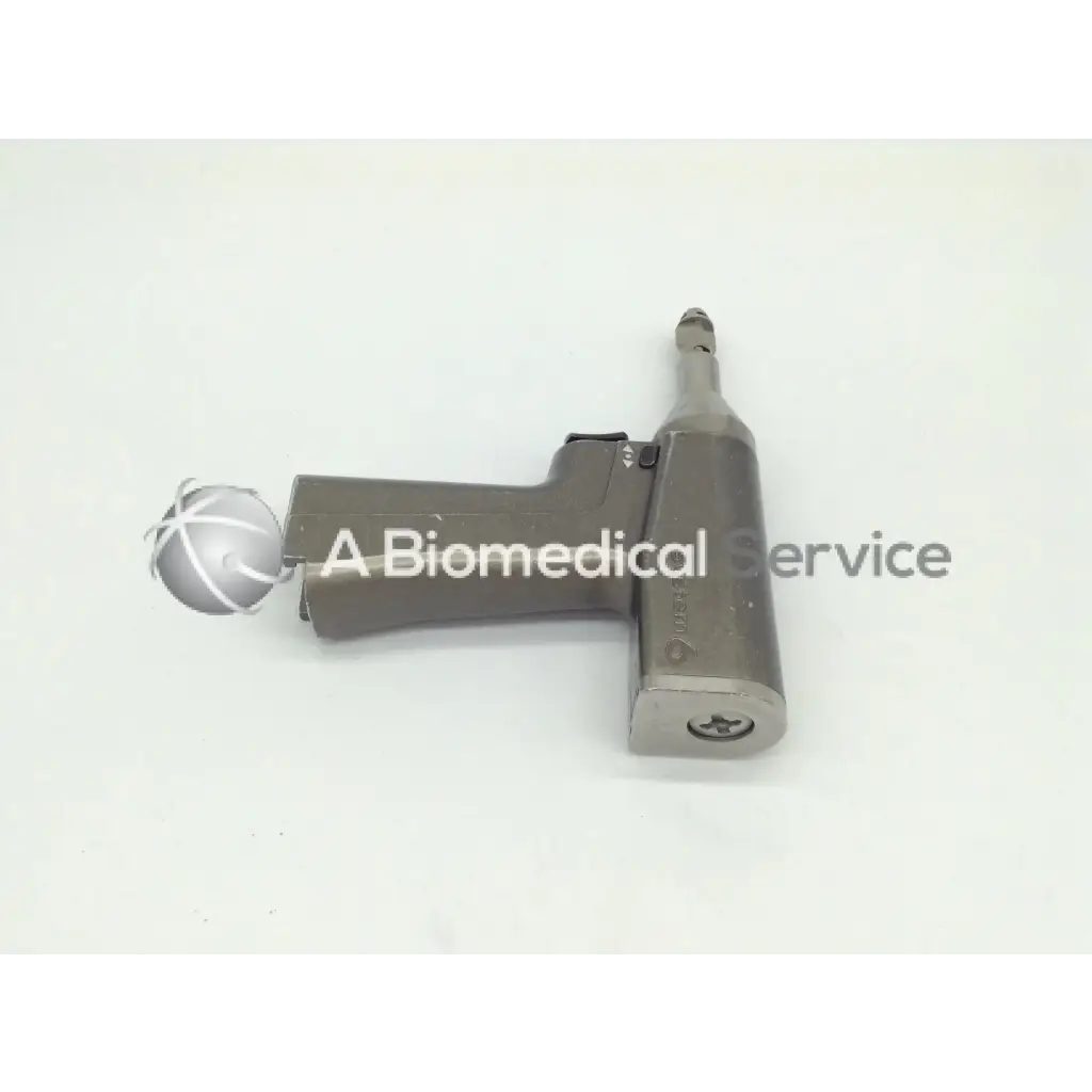 Gray metallic stryker system 6 recip reciprocating saw 6206 with white-tipped spherical surgical drill attachment