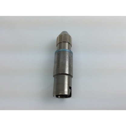 Silver metallic cordless driver with knurled grip and blue rubber band in stryker system 8 driver set aesculap case