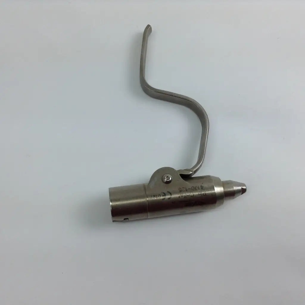 Stainless steel surgical instrument with curved handle and pointed tip included in stryker system 8 cordless driver set with aesculap case