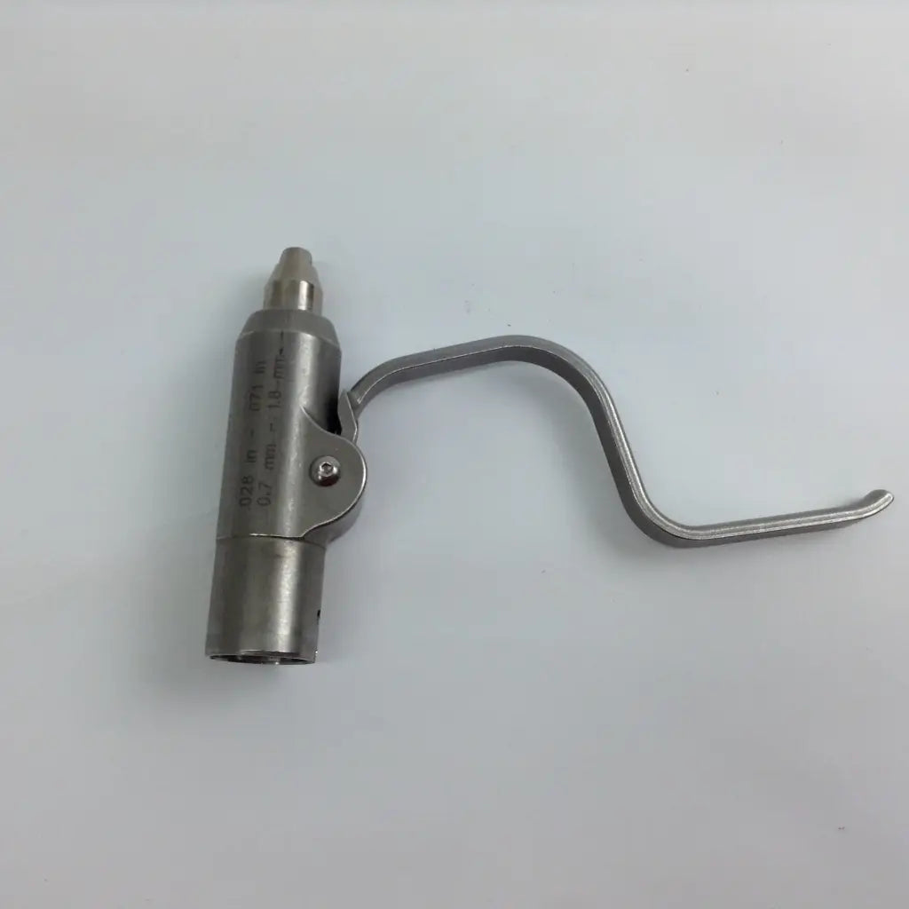 Silver metallic cordless driver with curved handle and engraved markings from stryker system 8 driver set with aesculap case